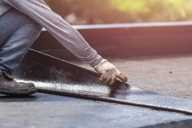 Professional Basement Waterproofing technician working in Millbrook, NY